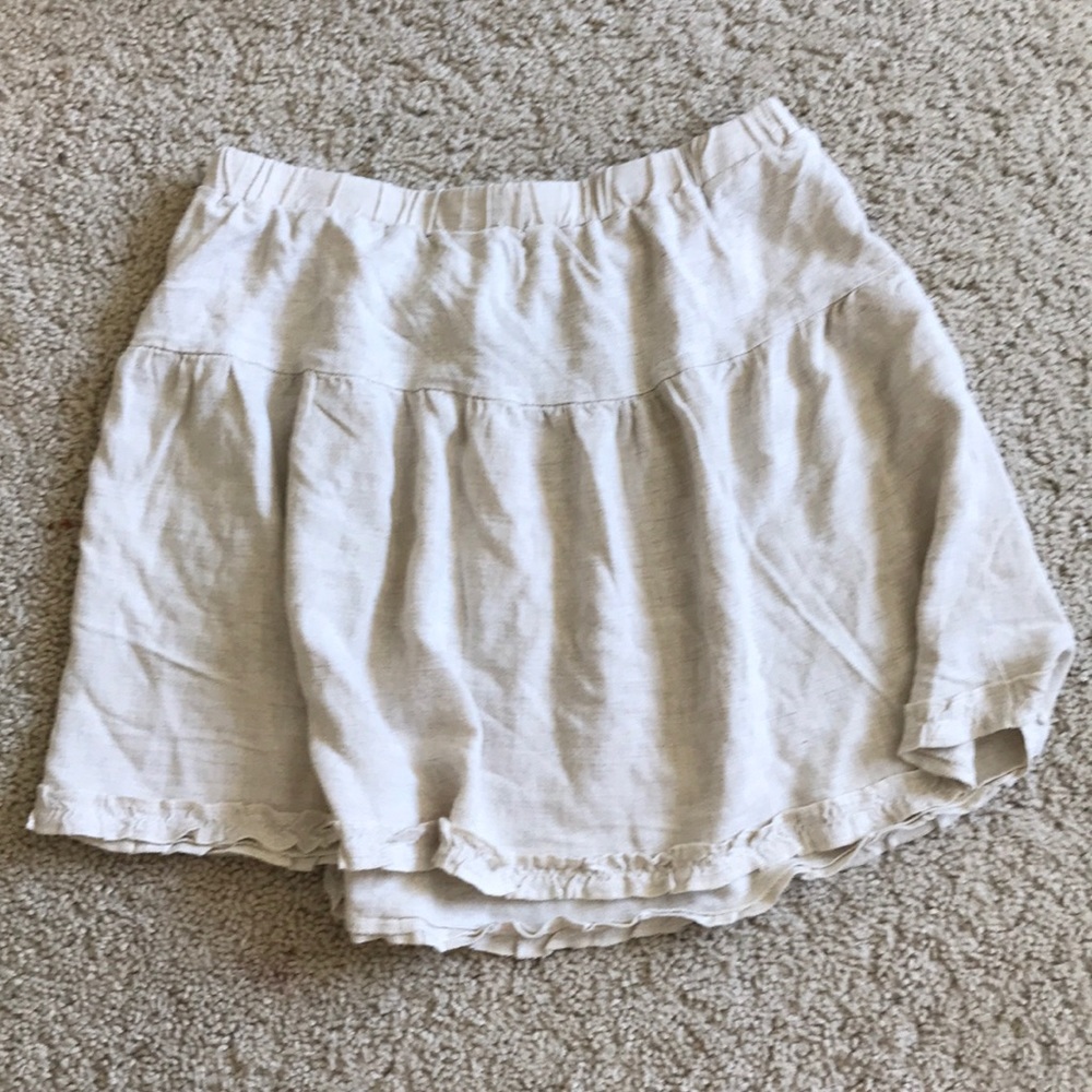 Light beige summer skirt.